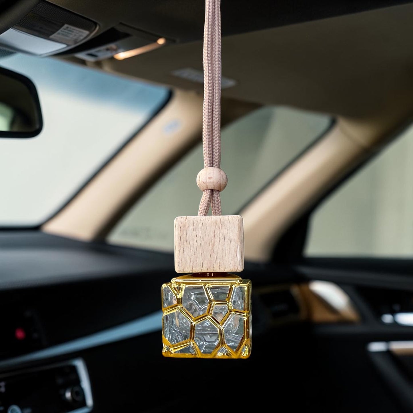 💎 Diffuseur voiture parfumé – Modèle Élixir Doré